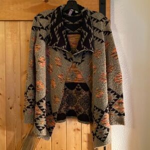 Neutral Knit Sweater with Colorful Woven Patterns